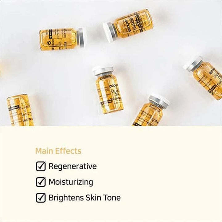 Dermalux Salmon DNA Gold Ampoule Serum Kit by Aarwaan featuring serum bottles with gold accents and salmon DNA branding.